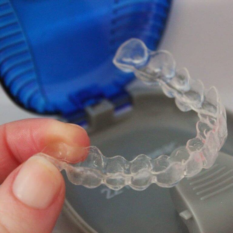 Does Invisalign hurt? Do invisible braces hurt like normal braces?